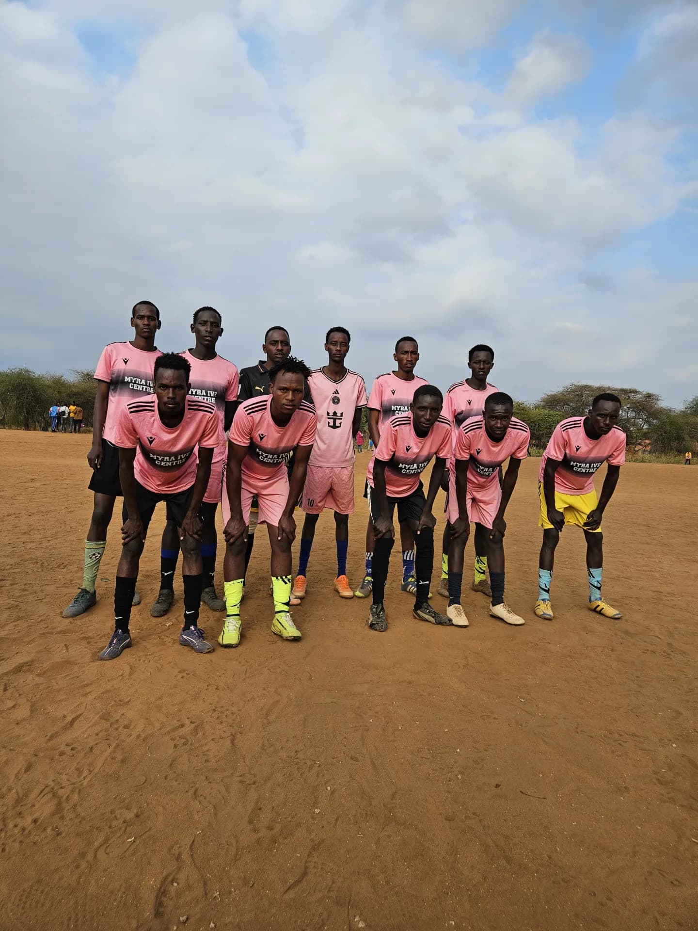 Football team in pink kits at the Maparasha tournament