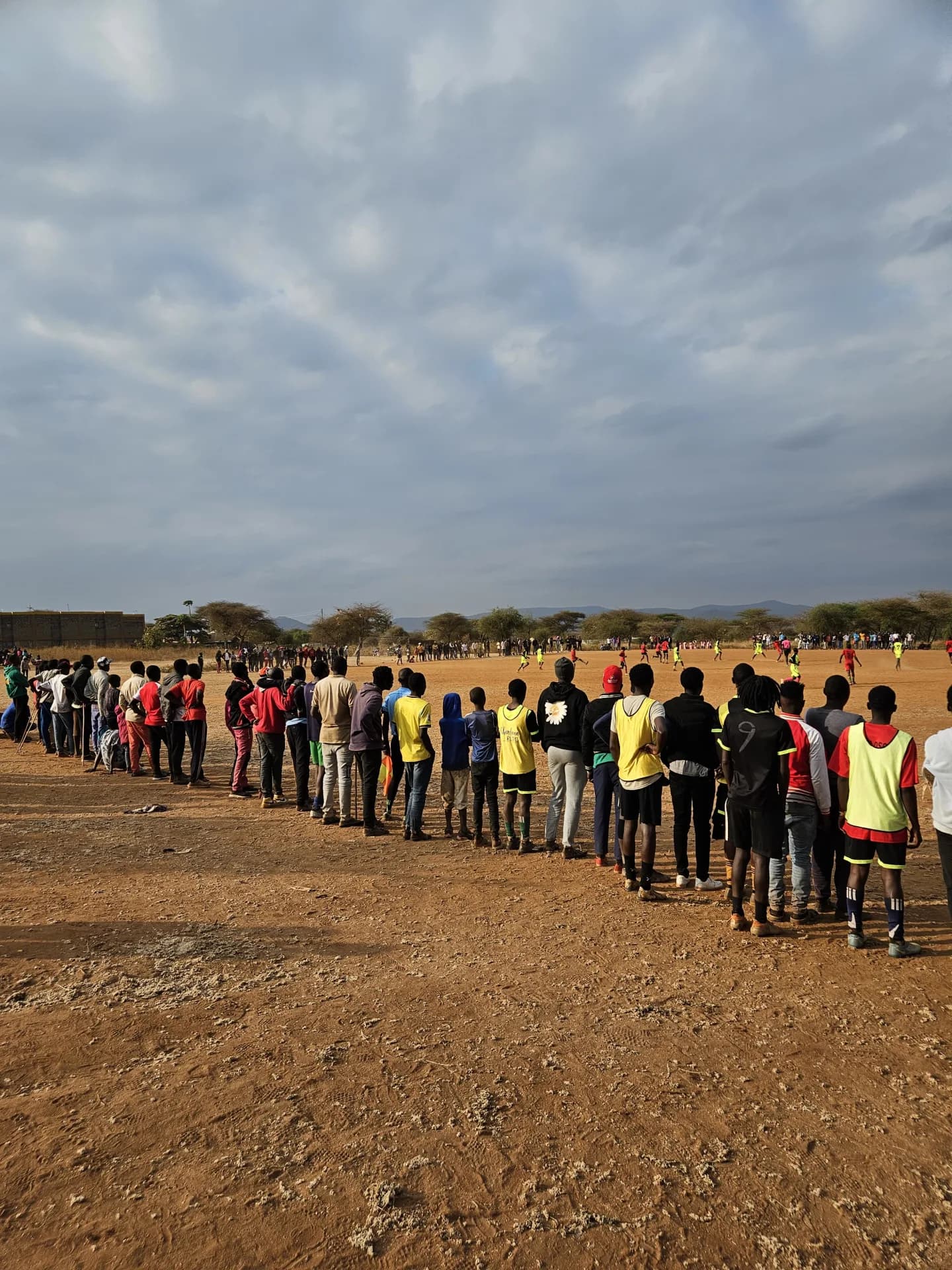Tournament participants lining up at the Maparasha football field