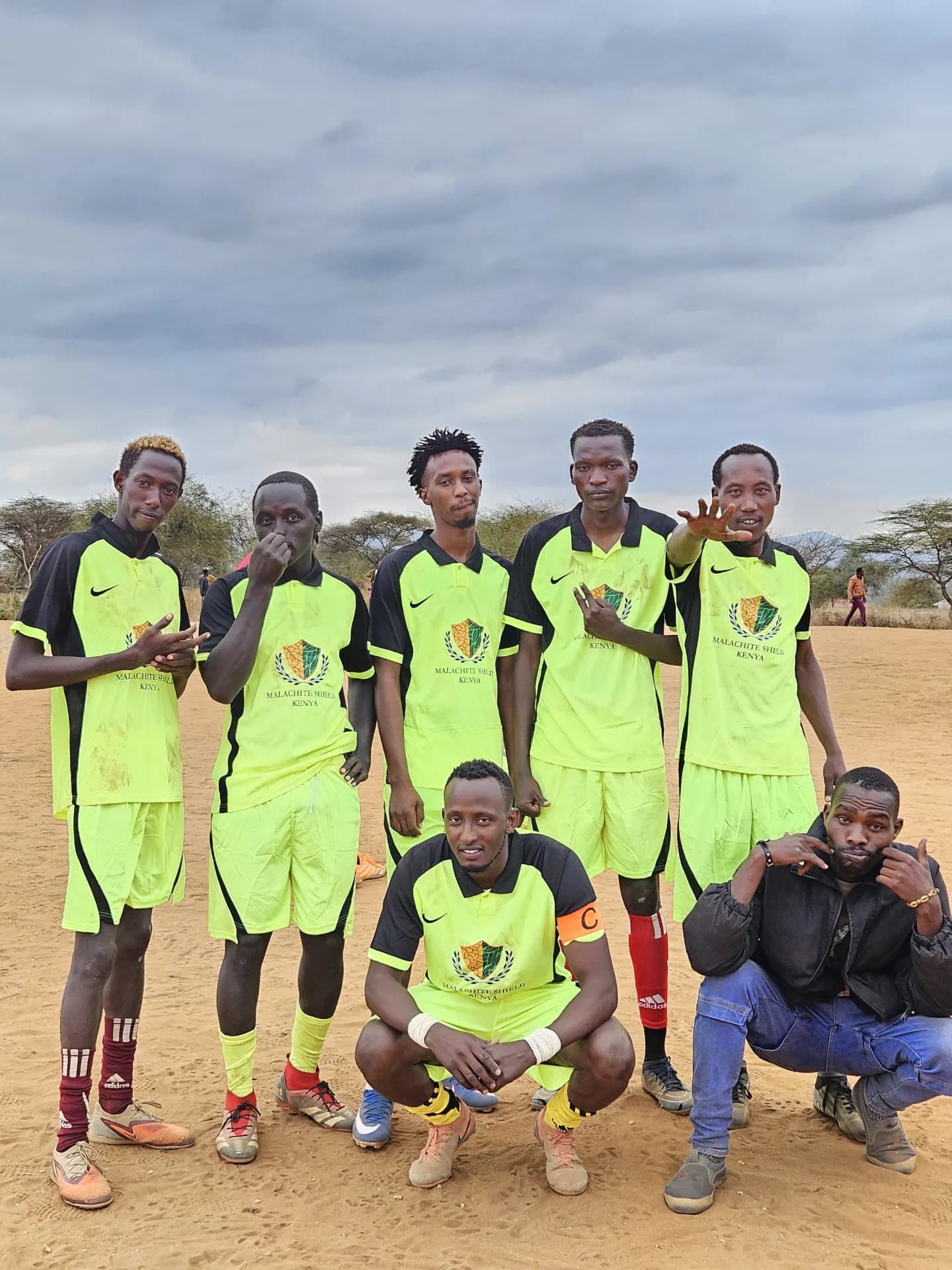 Maparasha football team in neon green kits