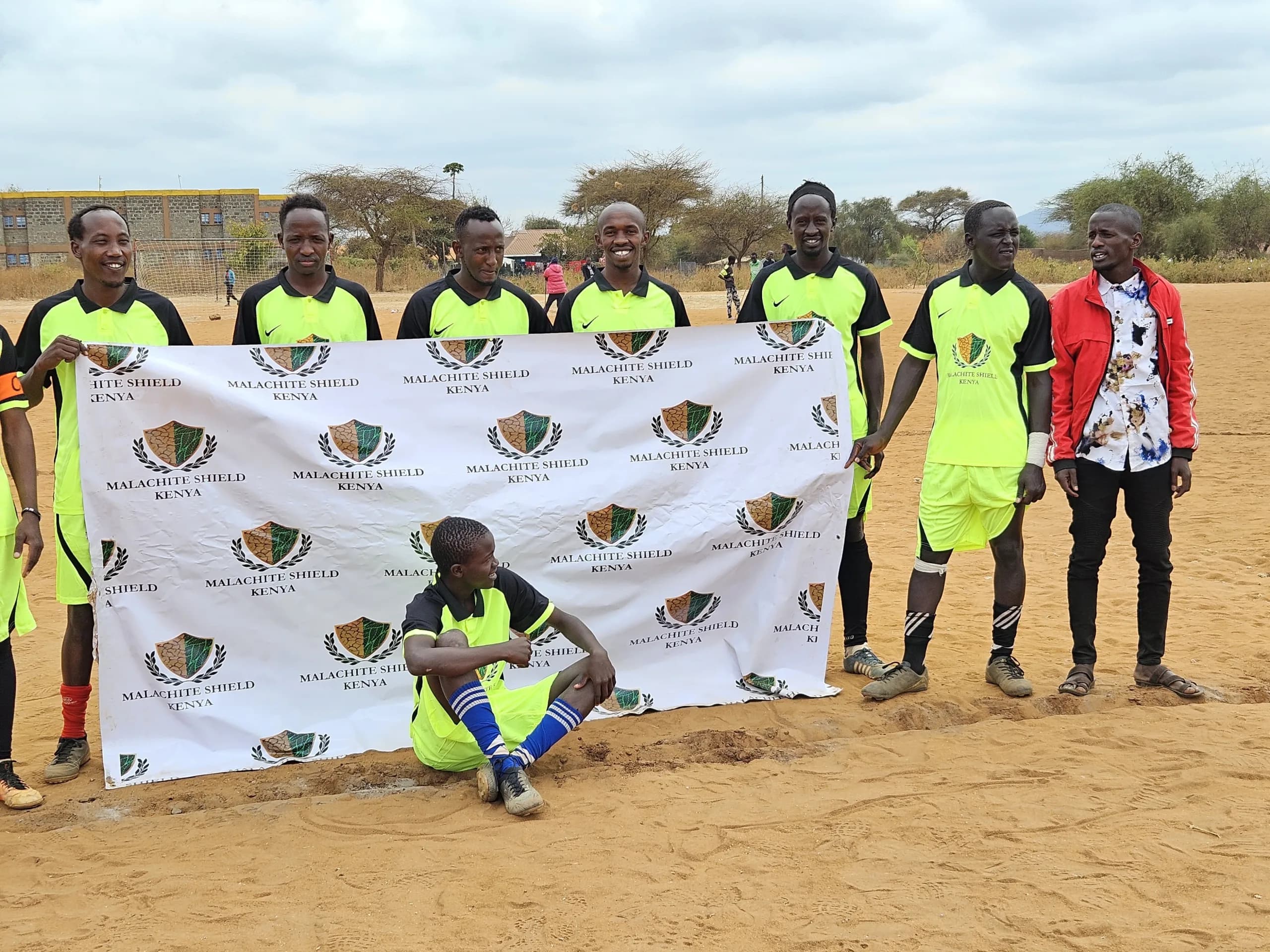 Tournament ceremony group photo at the Maparasha football field